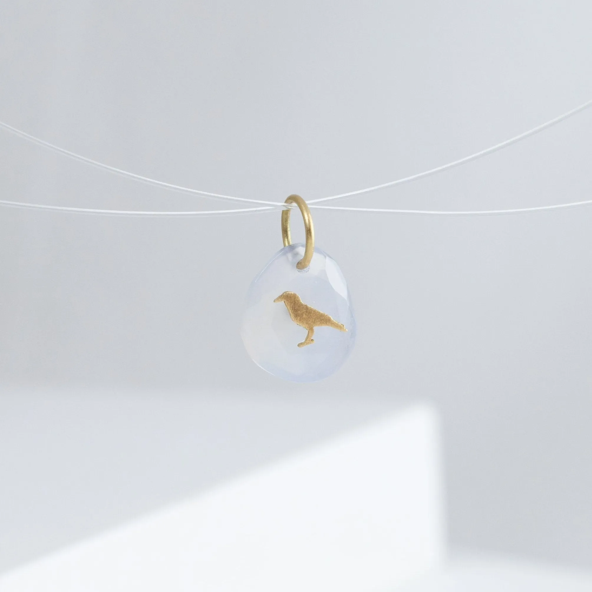 Crow chalcedony pendant