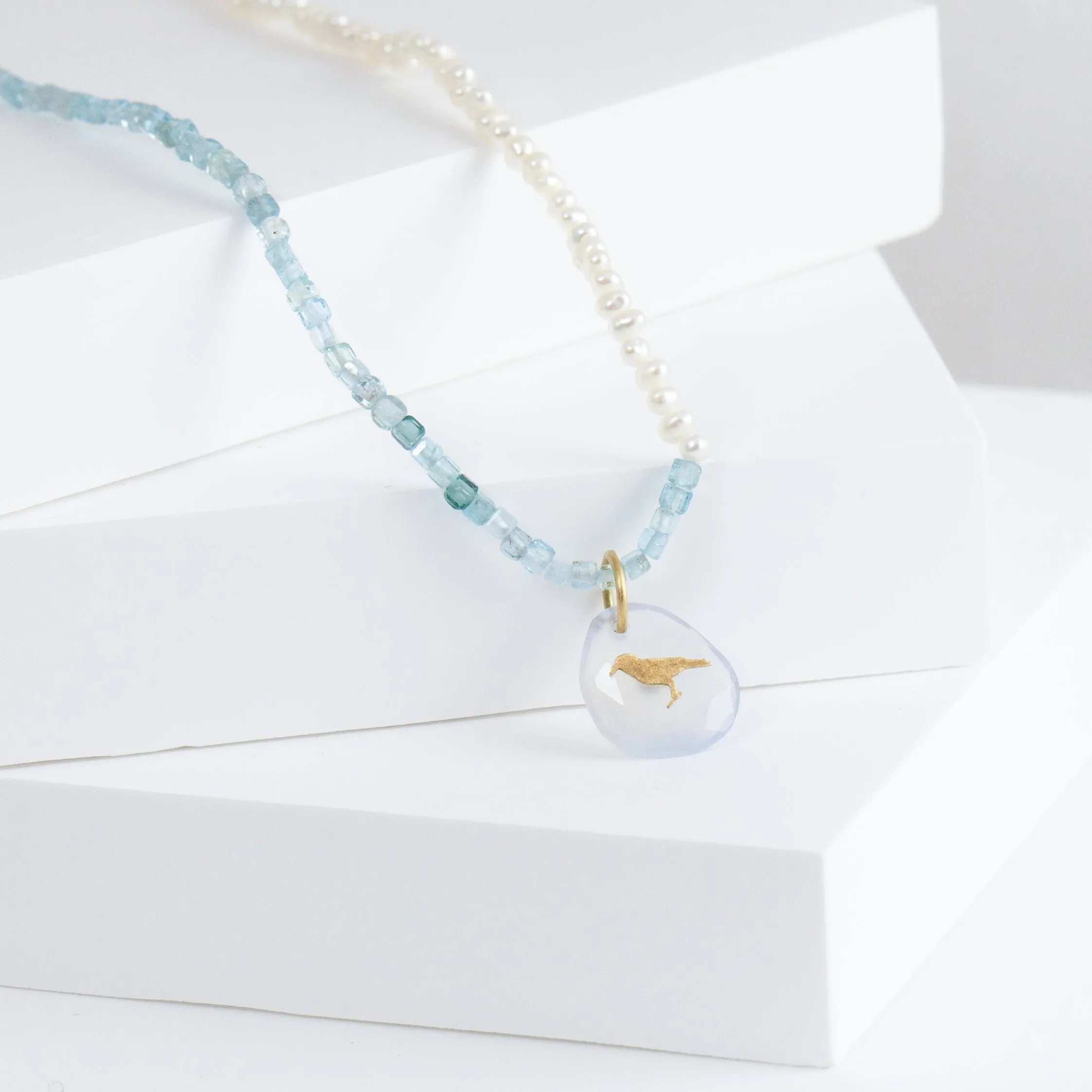 Crow chalcedony pendant